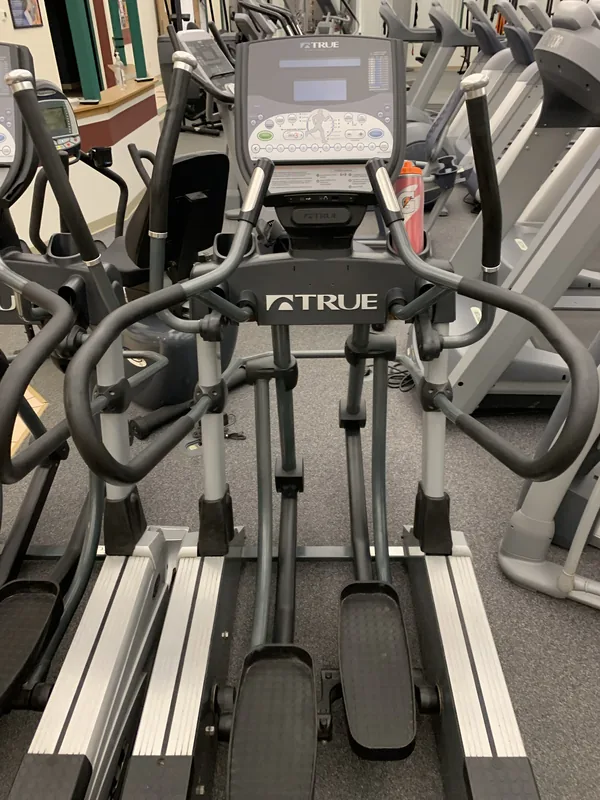 Row of TRUE elliptical cross-trainers on the cardio floor at HFH gym in Waupaca, WI