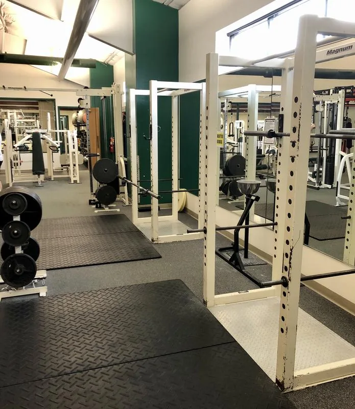 Squat racks in the free-weight area at HFH gym in Waupaca, WI